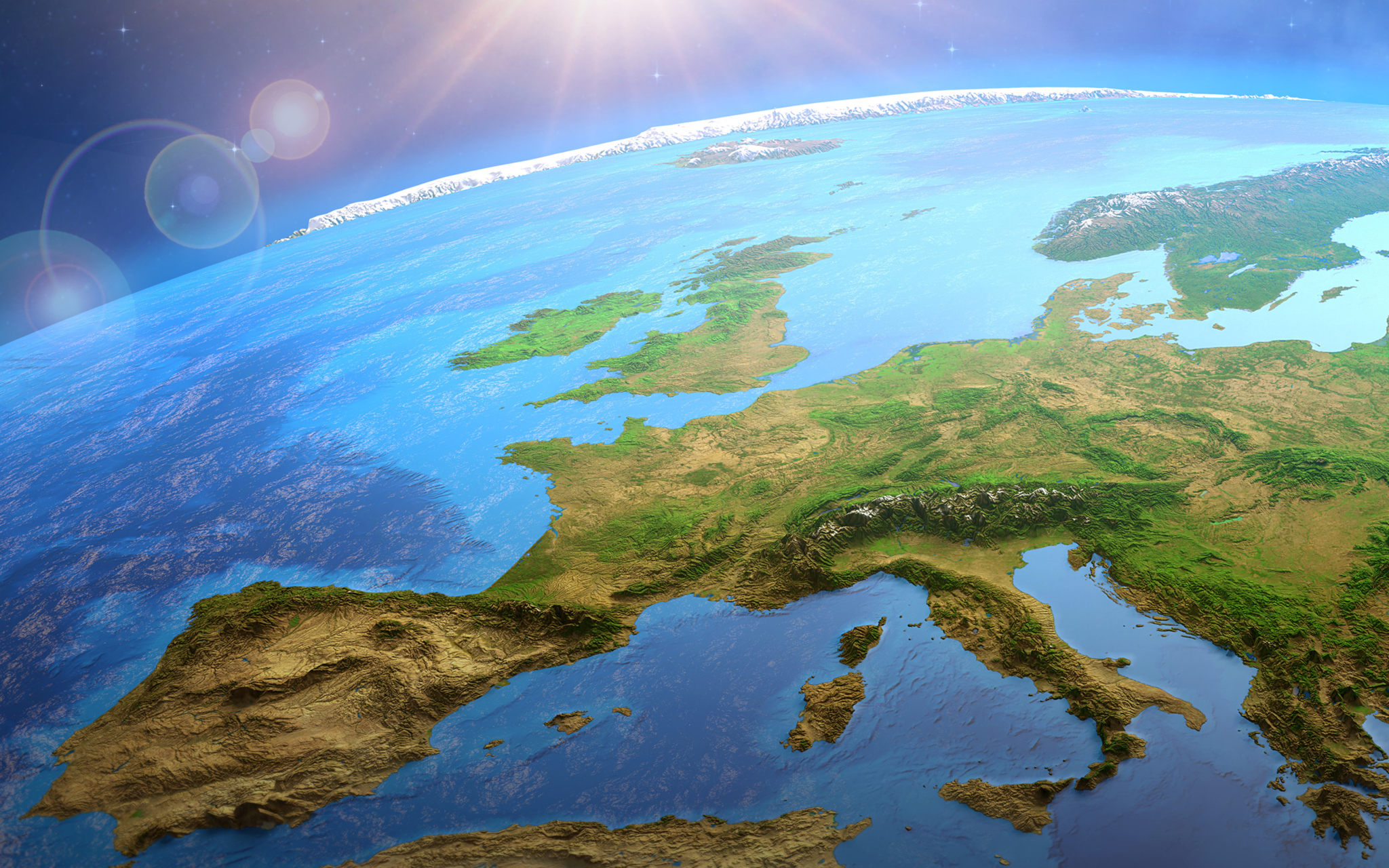 Sun shining over the Earth from space